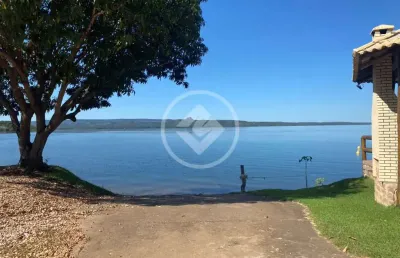 Casa de sossego à beira do lago do manso, dentro de condomínio, contento quatro suítes mobiliadas, todas com ar condicionados, duas salas, cozinha americana, duas varandas com ventiladores, piscina. c