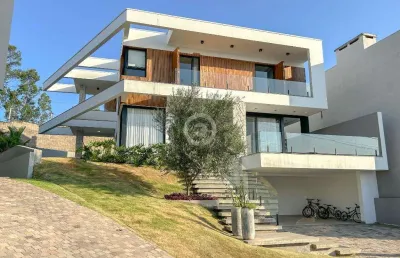 Casa à venda em estância velha, encosta do sol, com 3 suítes, com 336 m², horizon clube residencial