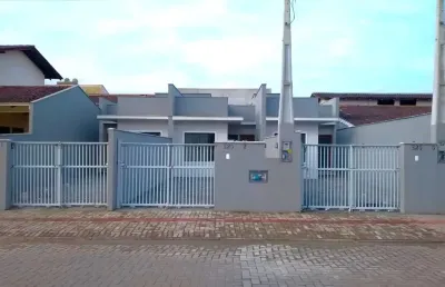 Geminado térreo com 71m2 e espaço aos fundos sendo 1 suíte + 1 quarto