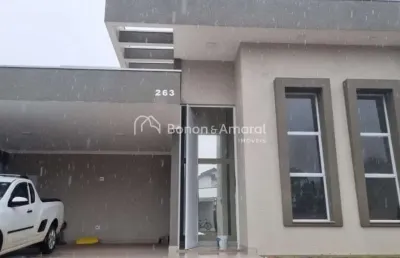 Casa à venda em condomínio, em paulínia, 3 suites, closet, lavabo, escritório, 4 vagas, aquecimento solar, piscina com cascata,fino acabamento.
