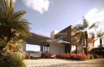 Casa térrea em condomínio com 3 suítes, sala dois ambientes, 5 banheiros e 2 vagas na garagem - unidade 12