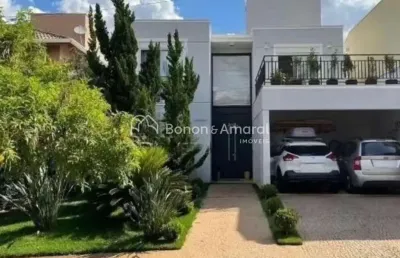 Casa moderna e sofisticada com 4 suítes e espaço multiuso no térreo