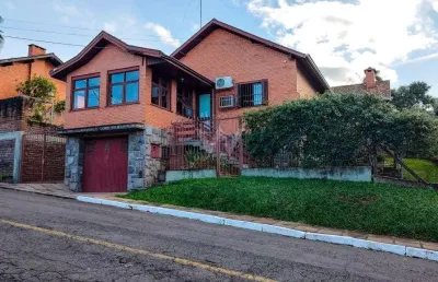 Casa com 3 quartos à venda na rua epitácio pessoa, --, primavera, novo hamburgo por r$ 1.300.000