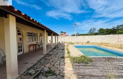 Casa linear 4 suítes e piscina privativa a 300 metros da praia.