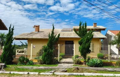 Casa com 3 quartos à venda na monsenhor leopoldo neiss, 555, dom feliciano, gravataí por r$ 1.190.000