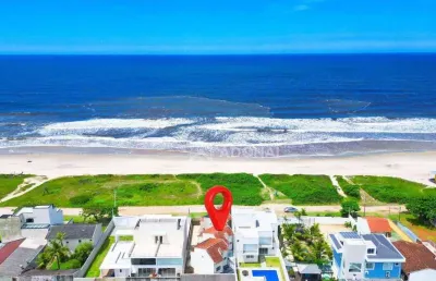 Sobrado em condomínio de frente para o mar, com 3 dormitórios à venda, 108 m² por r$ 700.000 - coroados - guaratuba/pr