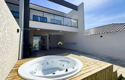 Sobrado novo a 1 quadra do mar, com 3 dormitórios à venda, 140 m² por r$ 750.000 - coroados - guaratuba/pr