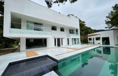 Casa com 4 suítes em condomínio no comary - teresópolis/rj.
