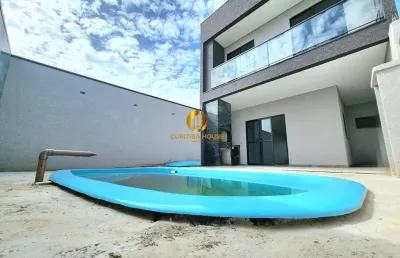 Sobrado alto padrão 3 quartos sendo 1 suíte,  espaço gourmet e espaçoso fundos com piscina no eucaliptos fazenda rio grande