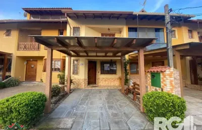 Casa com 3 quartos à venda na Avenida Edgar Pires de Castro, --, Hípica, Porto Alegre