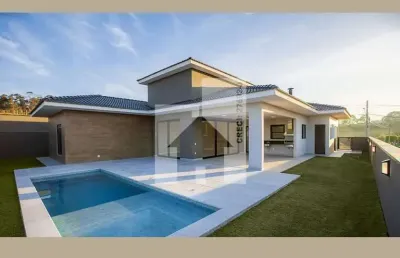 Casa térrea à venda com 4 suítes, 3 vagas, 325m² de área construida - condomínio terrad a alvorada,