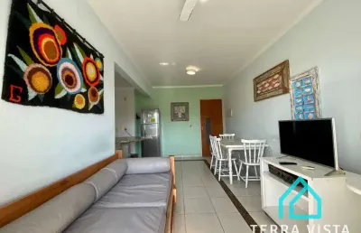 Luxuoso apartamento de 2 dormitórios a uma quadra da praia grande - lazer e conforto integrados!