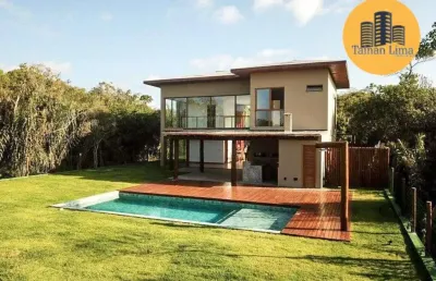 Casa de praia  alto padrão sendo 4  suítes  localizado na avenida do farol - praia do forte