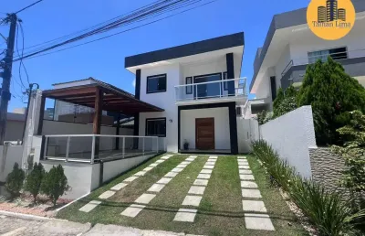 Casa alto padrão em lauro de freitas, 4/4 sendo 3 suites, reversivel, porteira fechada, decorada