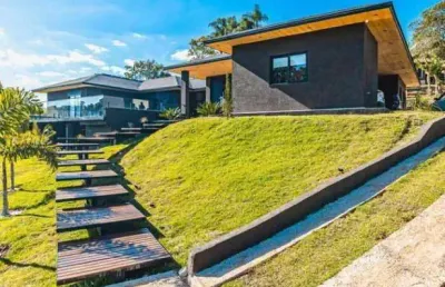 Casa luxuosa em condomínio fechado com 3 suítes, piscina, deck e área gourmet à venda em bragança paulista, 350 m² - jardim das palmeiras
