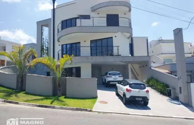 Sobrado de alto padrão com piscina, sauna, cascata, 04 suítes e 6 vagas  à venda, 336 m² por r$ 3.150.000 - residencial real park - arujá/sp