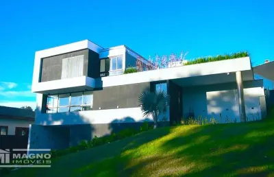 Casa de alto padrão no condomínio aruã ecopark com piscina, 4 suítes e 5 vagas cobertas - mogi das cruzes / sp