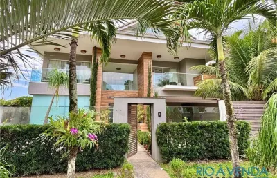 Casa de luxo à venda no condomínio quintas do rio  barra da tijuca | 4 suítes, piscina e área gourmet
