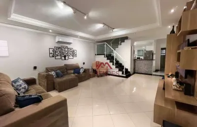 Sobrado com 3 dormitórios à venda, 121 m² por r$ 595.000,00 - maracanã - praia grande/sp