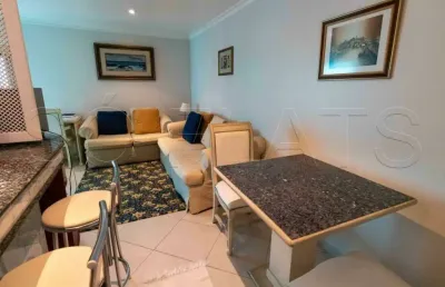Flat com 1 dormitório, lavanderia coletiva e vaga de garagem para locação.