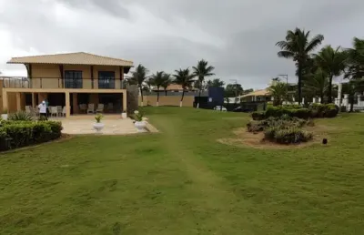 Casa em vilas do atlântico 7/4 sendo 5 suítes pé na areia