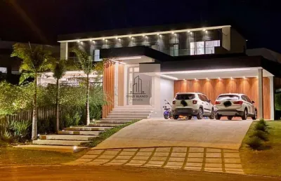 Linda casa térrea  no condomínio lago azul, com 4 suítes!