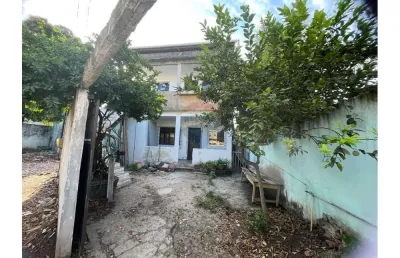Imóvel a venda, sendo 3 casas em um terreno de 329m2