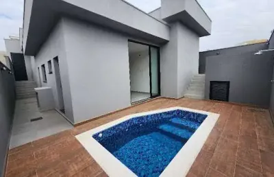 Casa em condomínio fechado de taubaté com 3 suítes, piscina, espaço gourmet