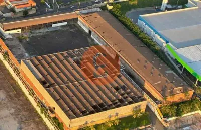 Venda ou aluga area de 27.000 m² com 12.000 m² de barracão à 2 km do centro
