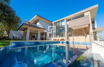 Casa de condomínio com 567.61 m², 5 quartos sendo 5 suítes à venda no bairro barigui.
