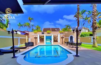 Casa com 4 dormitórios à venda, 380 m² por r$ 3.700.000,00 - jardim acapulco - guarujá/sp