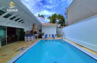 Casa com 5 dormitórios à venda, 270 m² por r$ 2.200.000,00 - jardim acapulco - guarujá/sp