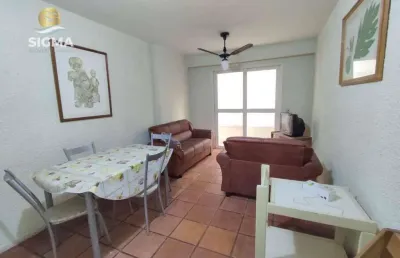 Apartamento localizado na praia das pitangueiras, 2 dormitórios mais dependência de empregada,  vista para o mar, 80 m² de área útil.