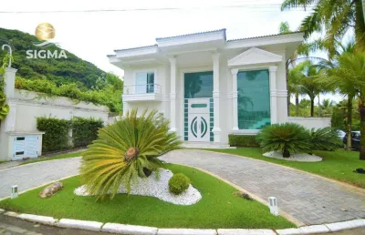 Casa na praia, condomínio fechado, 5 suítes, piscina, churrasqueira, costão do pernambuco, guarujá.