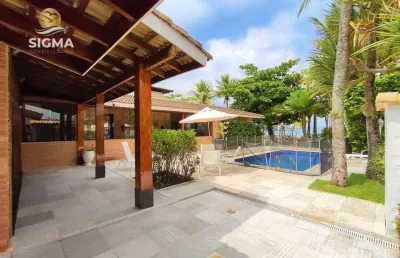 Casa na praia, frente mar, 4 suítes, piscina, 6 vagas, enseada, guarujá.