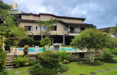 Casa na praia, condomínio fechado, 4 suítes, piscina, churrasqueira, jardim, costão do pernambuco, guarujá