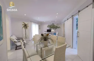 Apartamento com 4 suítes à venda na praia das pitangueiras, guarujá/sp.