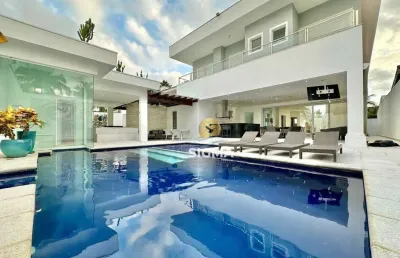 Casa com 5 suítes à venda no condomínio jardim acapulco - guarujá/sp.