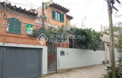 Casa em condomínio fechado com 3 quartos à venda na rua cuiabá, 308, medianeira, porto alegre, 140 m2 por r$ 395.000
