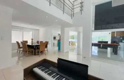 Casa em condomínio fechado com 5 quartos à venda na avenida juca batista, 9000, belém novo, porto alegre, 465 m2 por r$ 2.988.000