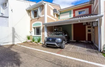 Casa em condomínio fechado com 3 quartos à venda na avenida josé aloísio filho, 965, humaitá, porto alegre, 86 m2 por r$ 550.000
