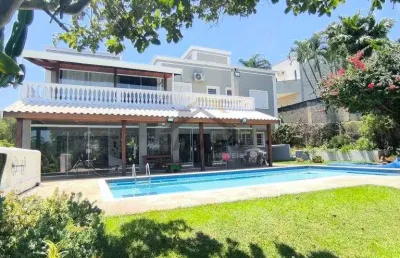Aluguel de casa mobiliada no condominio villa hipica i – 4 suites, sendo 1 no terreo, espaco gourmet, piscina aquecida e um belo jardim gramado com pomar