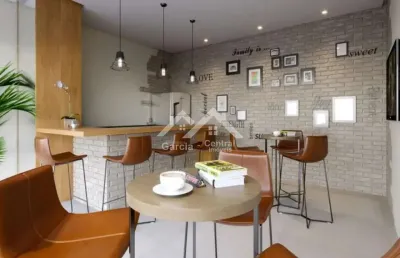 Apartamento novo, com prédio frente mar, com 2 dormitórios (1 suíte)