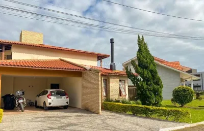 Casa em condomínio fechado com 4 quartos à venda na rodovia haroldo soares glavan, 3874, cacupé, florianópolis, 264 m2 por r$ 2.522.000