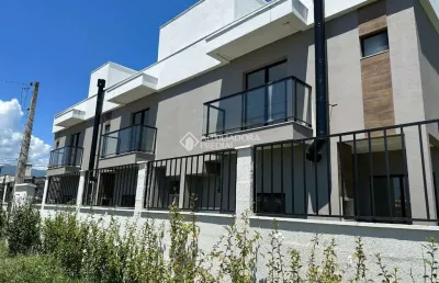Casa em condomínio fechado com 3 quartos à venda na avenida aleixo alves de souza, 892, nova palhoça, palhoça, 98 m2 por r$ 661.000