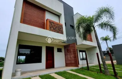 Casa com 3 quartos à venda na roberto teixeira de souza, 01, ibiraquera, imbituba, 129 m2 por r$ 1.491.006
