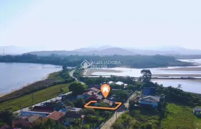 Casa com 3 quartos à venda na olino frontino de souza, 13, ibiraquera, imbituba, 312 m2 por r$ 460.000