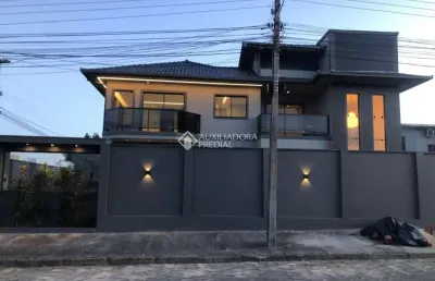 Casa com 4 quartos à venda na ernâni cotrim, 441, village, imbituba, 300 m2 por r$ 2.200.000