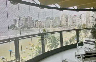 Praia de astúrias - alto padrão - lindo apartamento frente total ao mar - 2 garagens - lazer total - vista espetacular - melhor local.