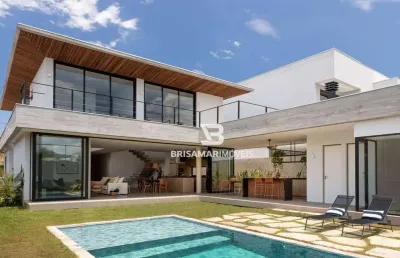 Casa de alto padrão em condomínio privilegiado no guarujá – 5 suítes, área gourmet e beach house